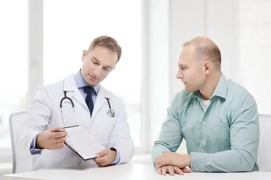 A patient speaking with a clinician about supportive care