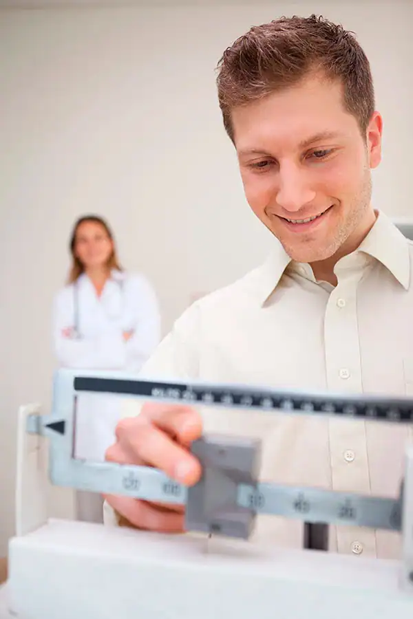 A clinician discussing a supervised weight management plan